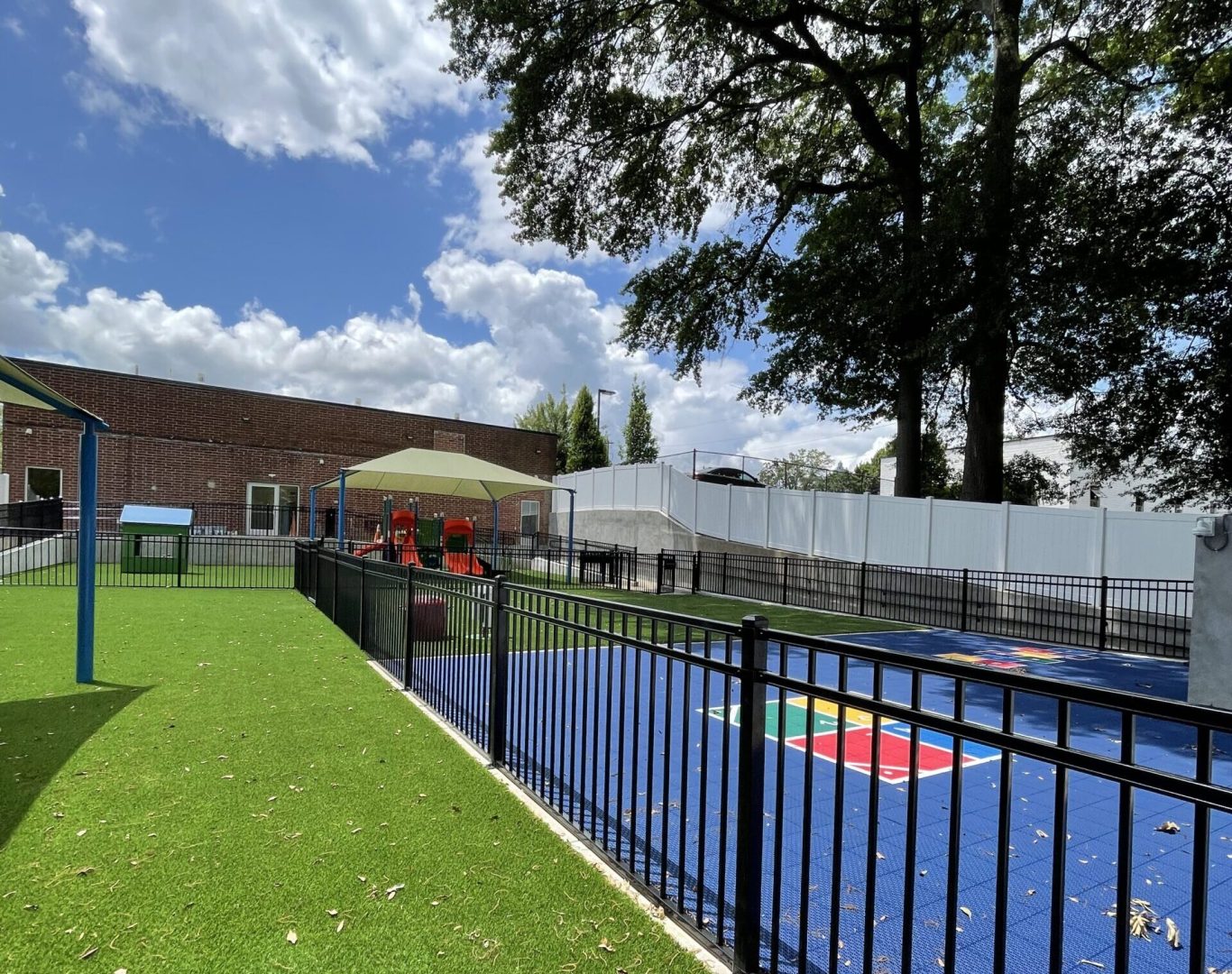 Commercial chain link fence installation at a Raleigh business property