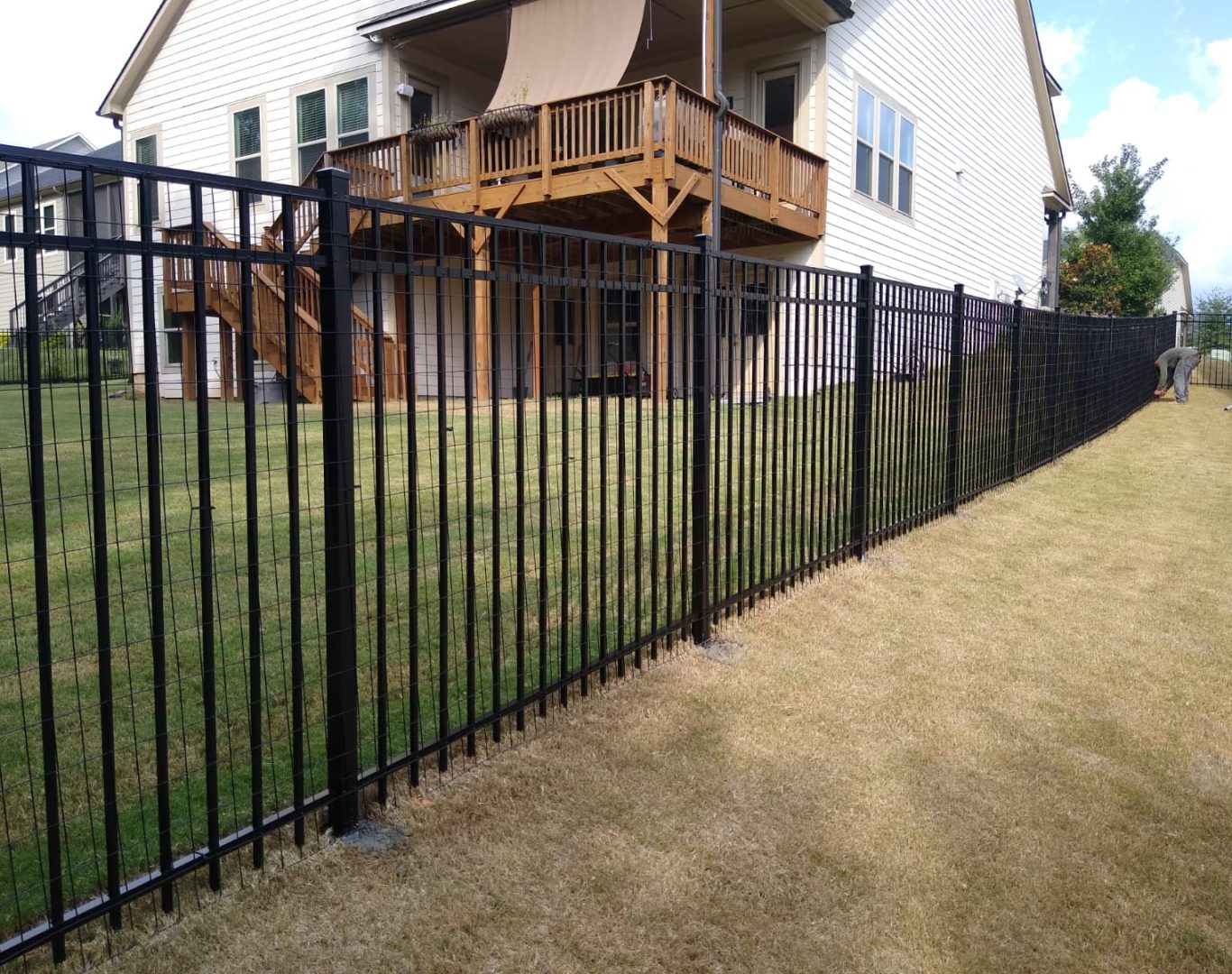 Ornamental steel fence surrounding an office park